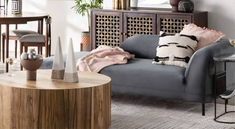 Living room with wooden coffee table and modern dark gray couch